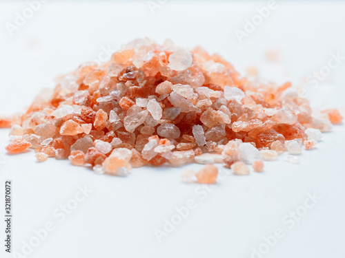 Himalayan Pink Rock salt on a white background