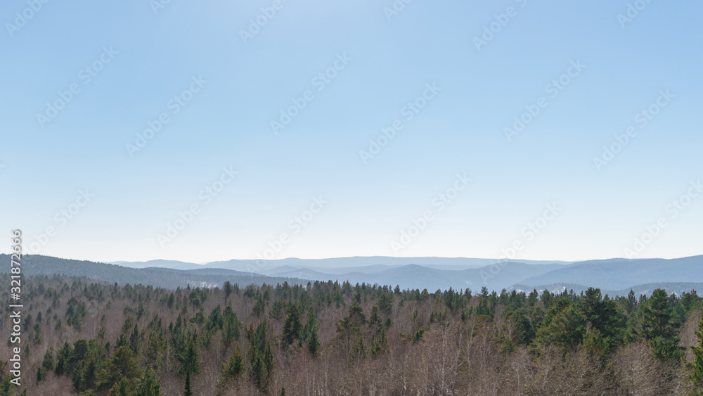 Mountains and coniferous forest, Siberia, 2/3 of the sky Mountains and coniferous forest, Siberia, 2/3 of the sky