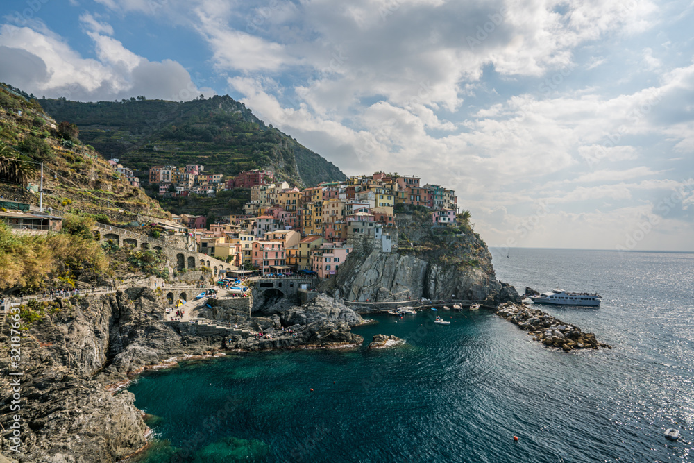 Italian coastline and colorful Manarola village in Cinque Terre, Italy.
