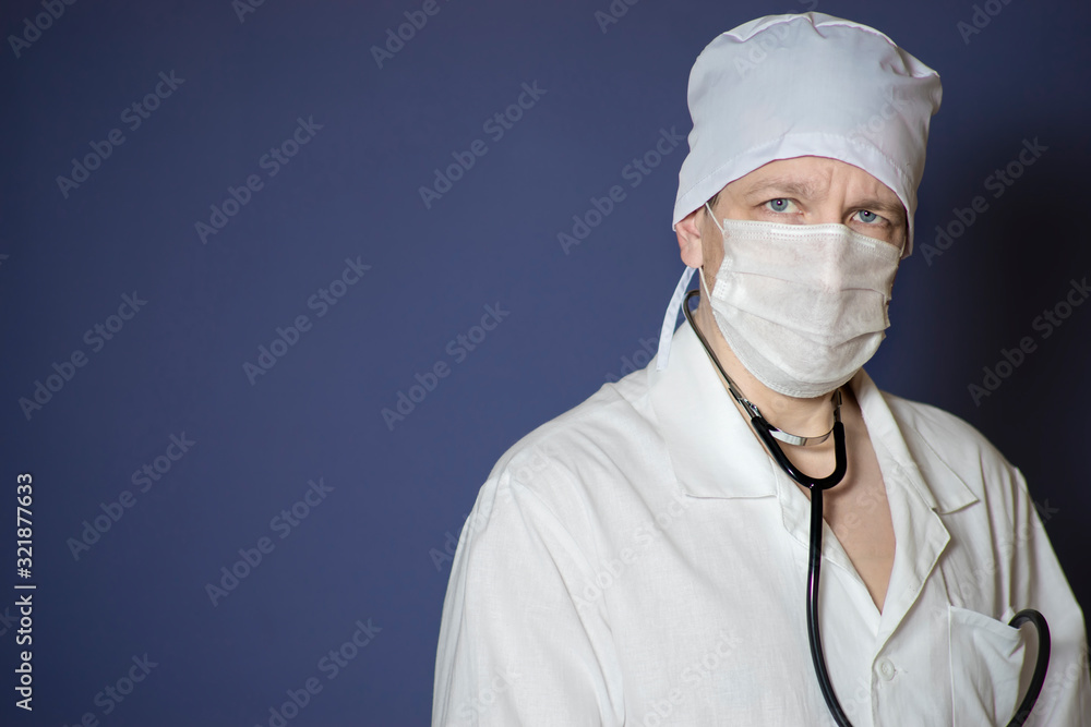 A doctor with a respiratory mask and a stethoscope. A doctor with a respiratory mask and a stethoscope.