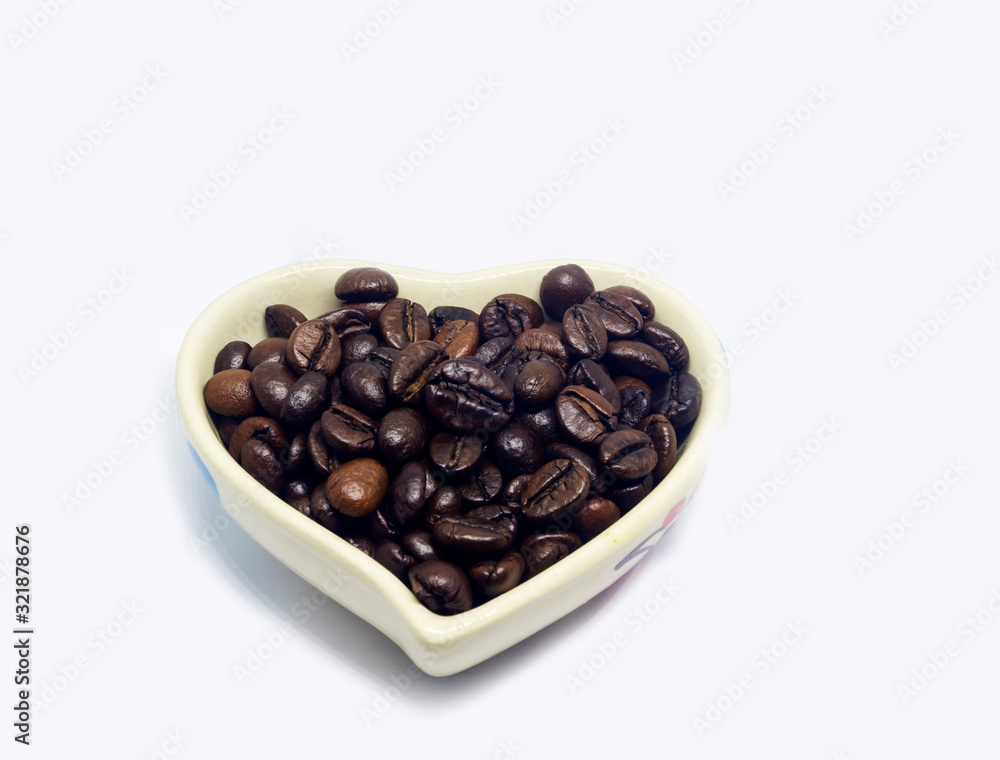 coffee beans in a white cup