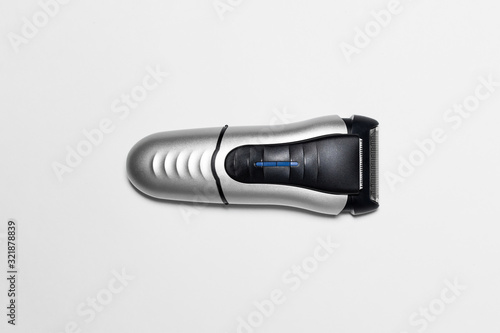 Modern battery Electric Shaver for man isolated on white background with clipping path.High resolution photo.Top view.Close-up.