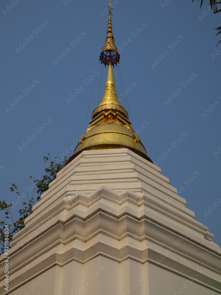 Fototapeta premium Temple in Chiangmai Thailand Beautifully decorated with wonderful colours statues of Buddha, Payanak, and Monks on walking street in the old city