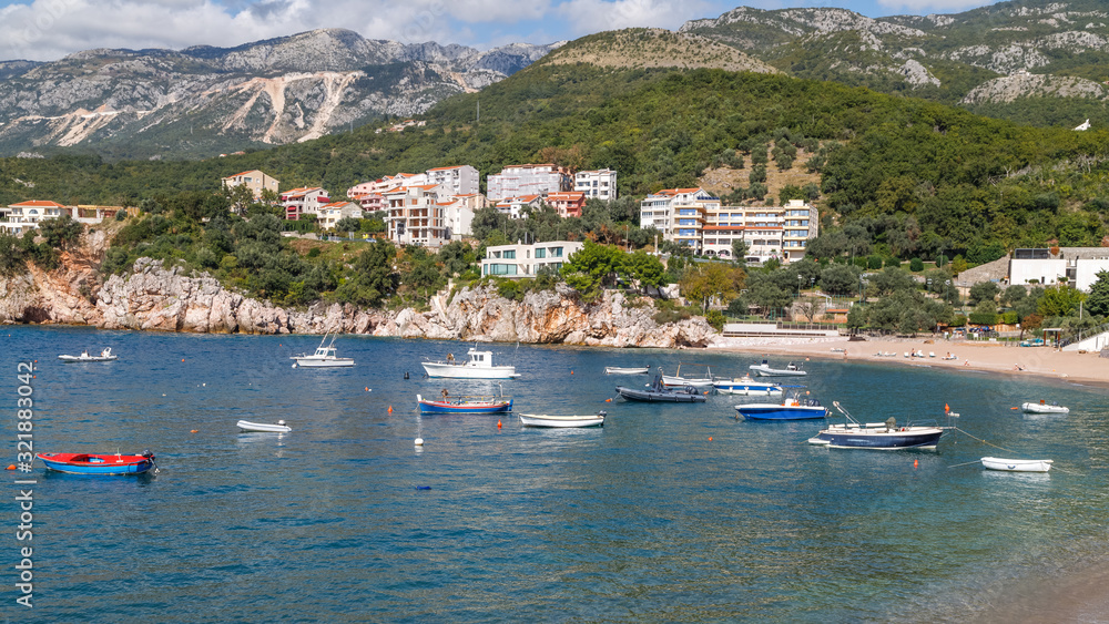 Yachts, boats and picturesque coastline of the Bay of Kotor (Boka Kotorska), Montenegro.