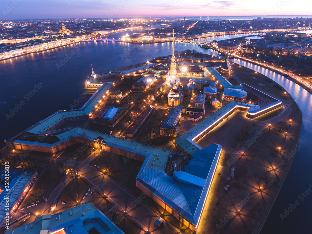 Obraz premium Beautiful night view of Saint-Petersburg, Russia, Peter and Paul Fortress with cityscape and scenery beyond the city