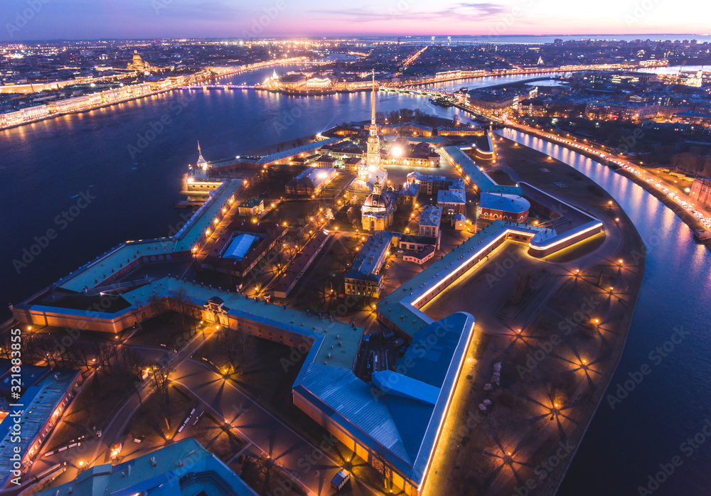 Obraz premium Beautiful night view of Saint-Petersburg, Russia, Peter and Paul Fortress with cityscape and scenery beyond the city