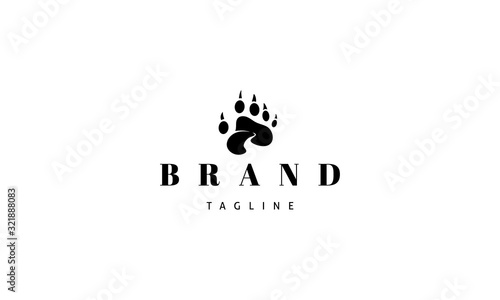 Vector logo on which an abstract image of a bear paw in the center of which a creek.