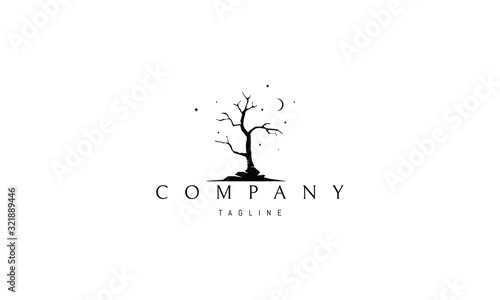 Vector logo on which an abstract image of a gloomy tree at night.