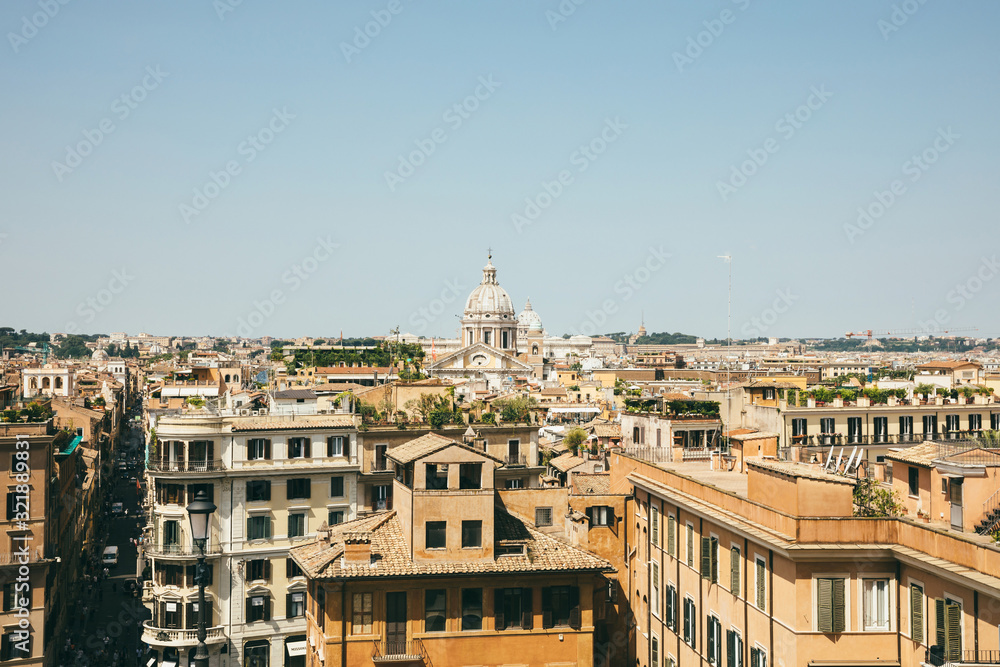 Obraz premium Panoramic view of city Rome with old houses from the Spanish steps