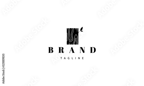 Vector black logo on which an abstract image of a wooden card and leaf.