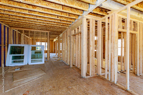 Residential home framing view on new house wooden under construction