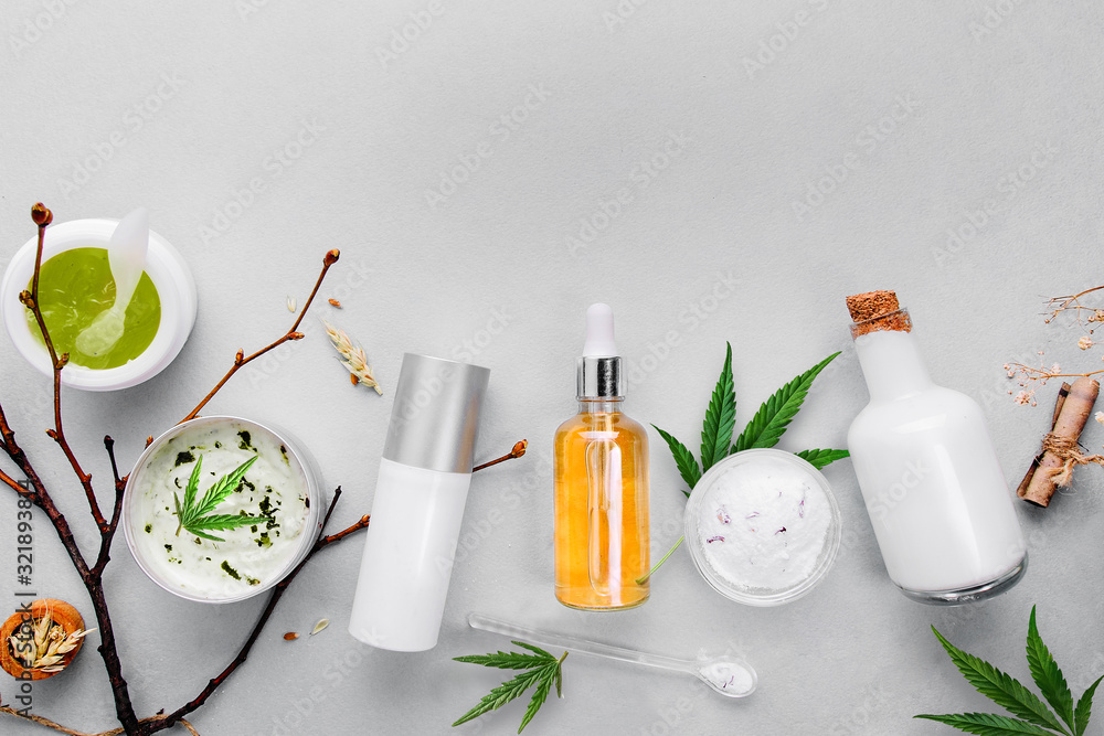 Cosmetics with cannabis CBD oil on light background. Concept natural skin care - obrazy, fototapety, plakaty 
