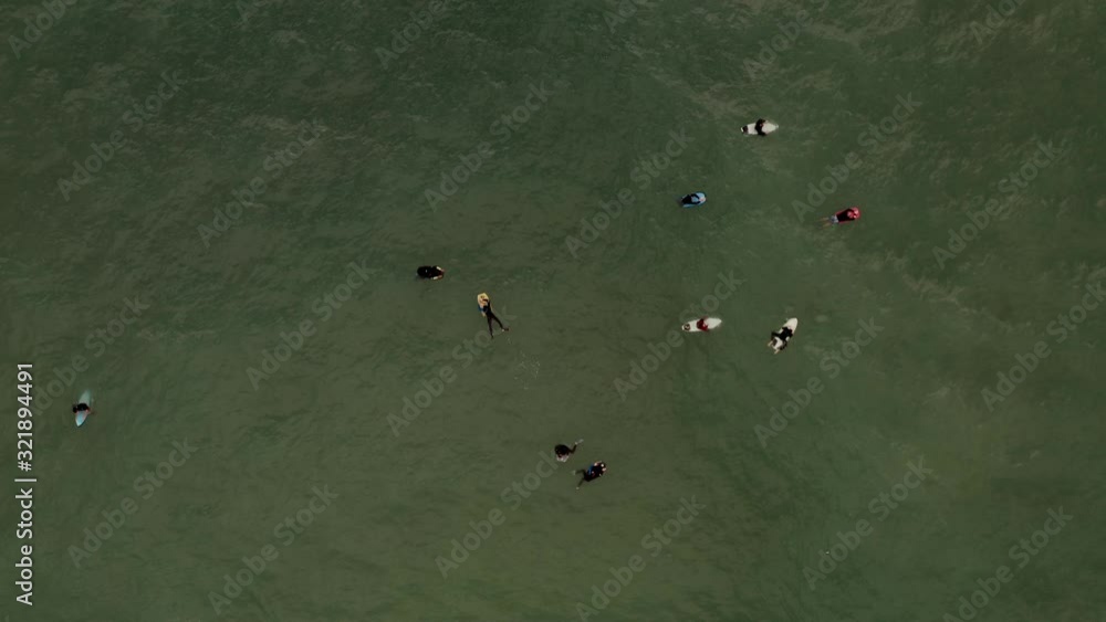 Aerial view of surfers and bodyboarders waiting for waves. Biarritz, France. Aerial view of surfers and bodyboarders waiting for waves. Biarritz, France.