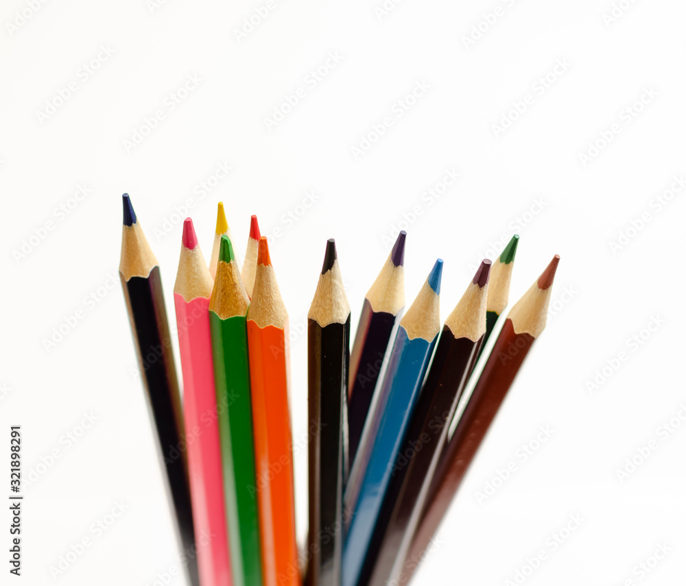 set of colored pencils on a white background set of colored pencils on a white background