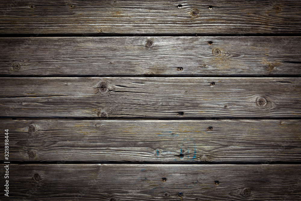Dark wooden background texture. Old fence panels with natural patterns. Dark wooden background texture. Old fence panels with natural patterns.