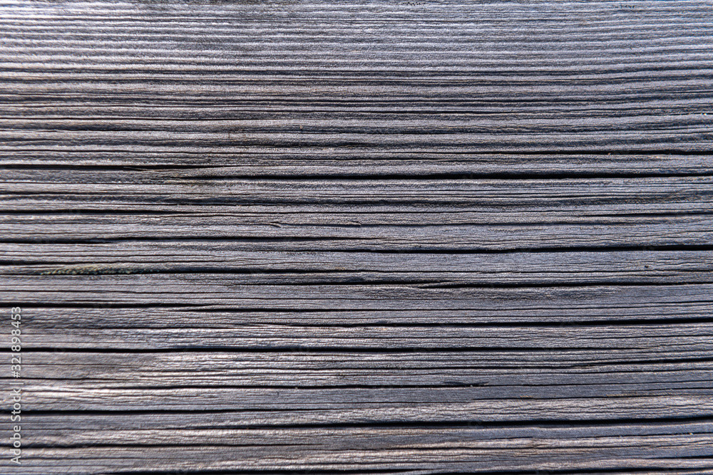 Dark wooden background texture. Old fence panels with natural patterns.