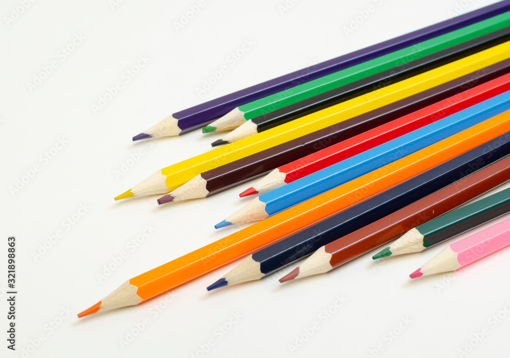 set of colored pencils on a white background set of colored pencils on a white background