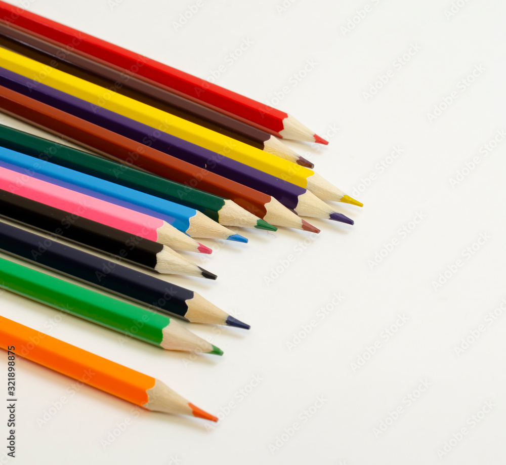 set of colored pencils on a white background set of colored pencils on a white background