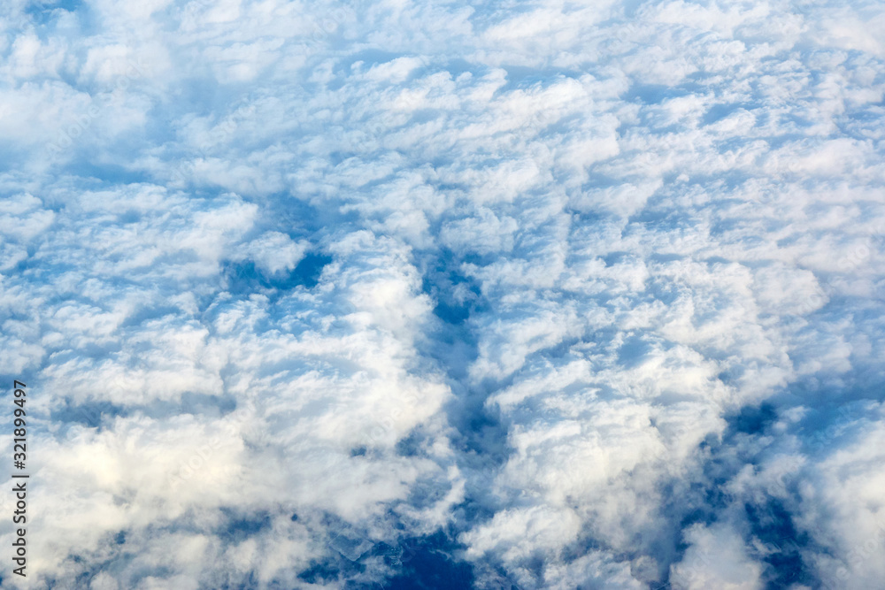 View over the clouds and blue sky. View over the clouds and blue sky.