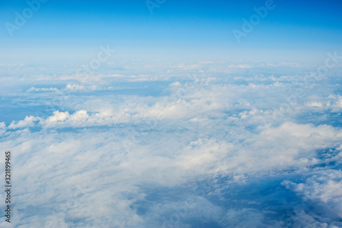 View over the clouds. Blue sky and clouds.