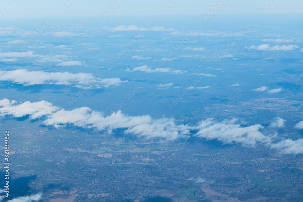 View over the clouds and blue sky. View over the clouds and blue sky.