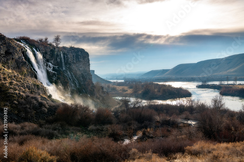 Large waterfall flows into the Snake river Idaho