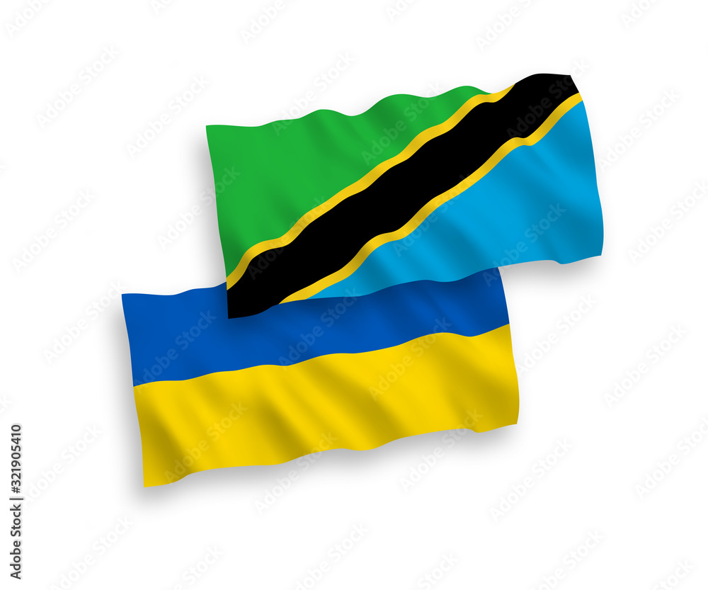 Obraz premium National vector fabric wave flags of Tanzania and Ukraine isolated on white background. 1 to 2 proportion.