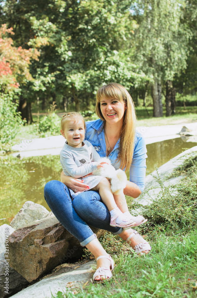 Fototapeta premium family shot in the park, summer day.