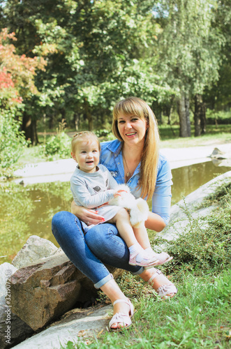 family shot in the park, summer day. © younnona