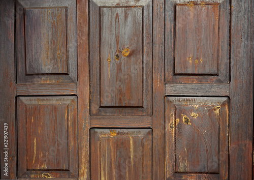fragment of an old oak door in the Polish countryside