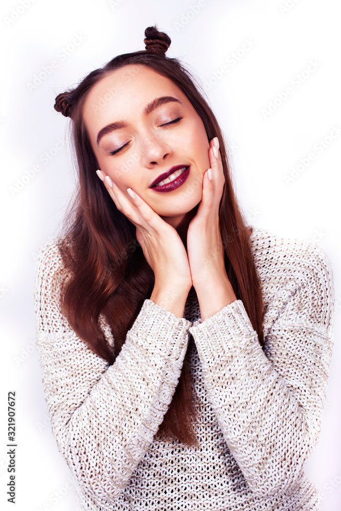 young pretty teenage hipster girl posing emotional happy smiling on white background, lifestyle people concept young pretty teenage hipster girl posing emotional happy smiling on white background, lifestyle people concept