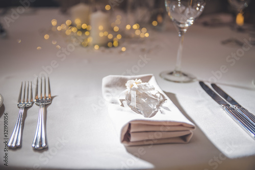 A photo of place settings laid out on a restaurant table photo