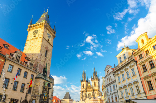Prague Old Town Square (Stare Mesto) historical city centre with Astronomical Clock (Orloj) and Tower of Old Town City Hall building, Gothic Church of Our Lady before Tyn, Bohemia, Czech Republic