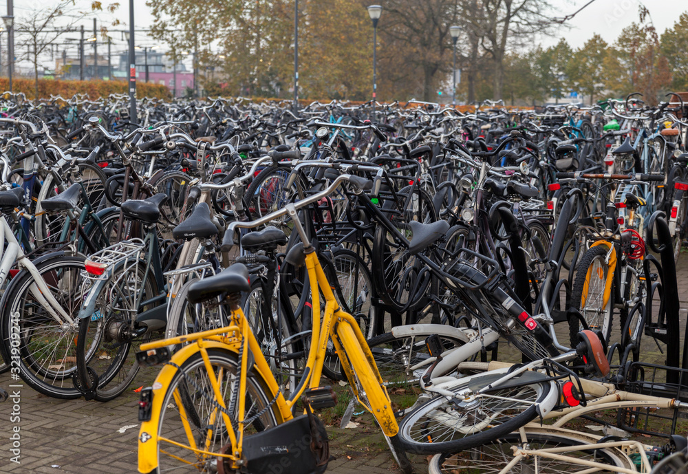 Bicycle parking,bunch of different bicycles the favourite type of transport in Netherlands