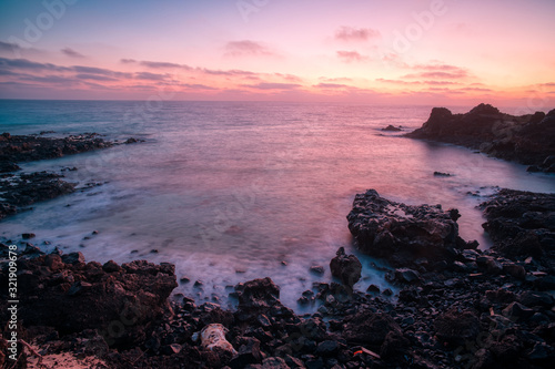 sunset on stone coast of Fuerteventura