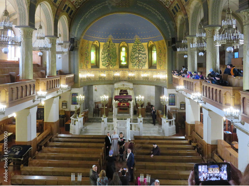 Interior Of The Moscow Choral Synagogue. A raised platform for Torah reading. The dome of the temple,  gallery of the second floor.