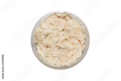 Pork lard in a container on a white background.