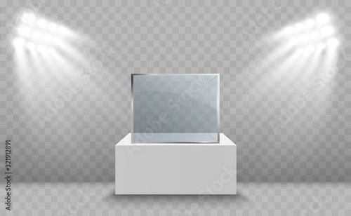 Glass showcase for the exhibition in the form of a cube. Background for sale illuminated by spotlights. Museum glass box isolated advertising or business design boutique. Exhibition hall.