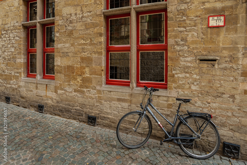 Bicycle and Stone Wall in Bruges, Betgium