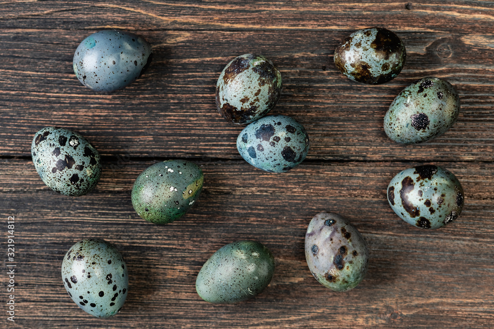 Quail eggs on wooden background Quail eggs on wooden background