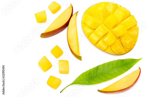 mango slices with green leaves isolated on white background. healthy food. top view