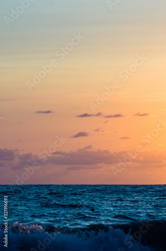 Amazing sea sunset, the sun, waves, clouds