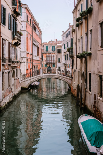 Narrow canal and bridge in Venice  Italy