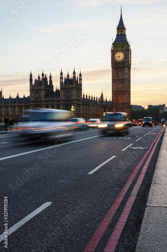 Cars passing by Big Ben in London England United Kingdom UK