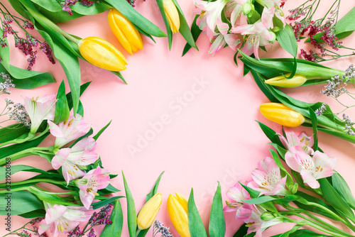 Fototapeta Naklejka Na Ścianę i Meble -  Pink background with spring flowers, festive composition for spring holidays