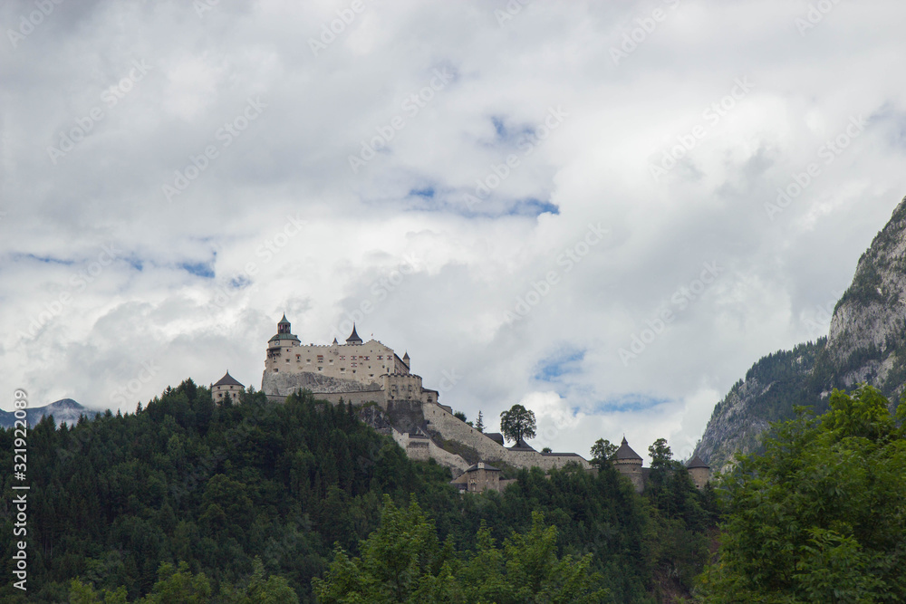 view of valley in Austrian alps with Hohenwerfen castle