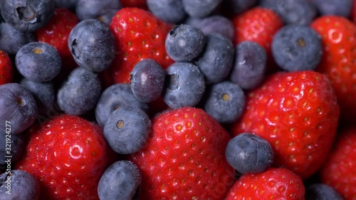 tasty strawberries with blueberries photo