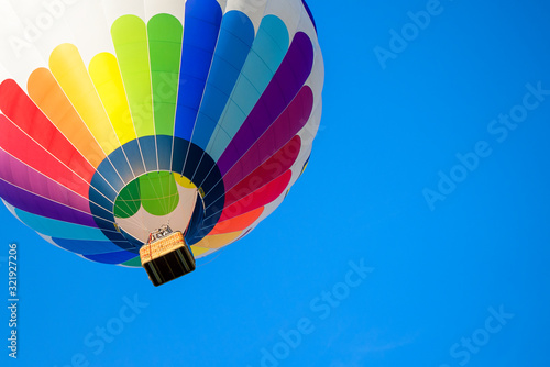 Fototapeta colorful hot air balloon on a beautiful summer day