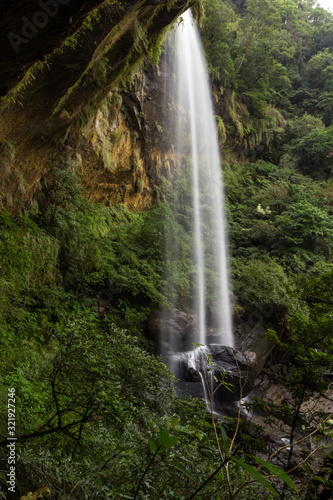 Scenic view of the tall Motian Waterfall along the Sandiaoling Waterfall Trail in Taiwan.