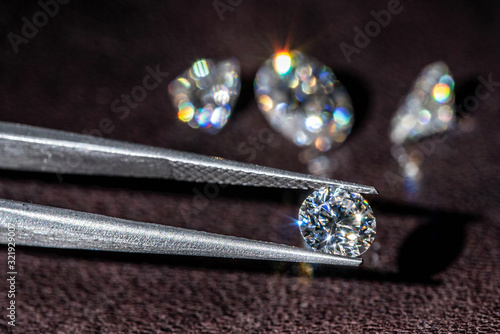 Diamond in Tweezers. Gemstone Jewelry Making
